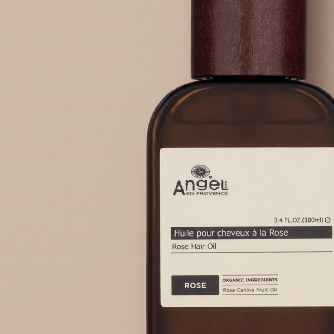 Angel Rose Hair Oil 100ml bottle with delicate rose-toned packaging and argan oil formula for hair repair