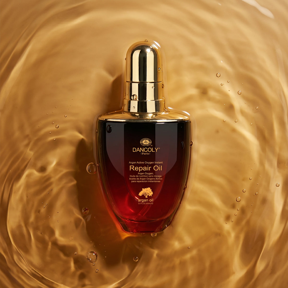 Photo of the bottle of Dancoly Paris Argan Oil repair oil with a soft background - available at Angel hairacre NZ